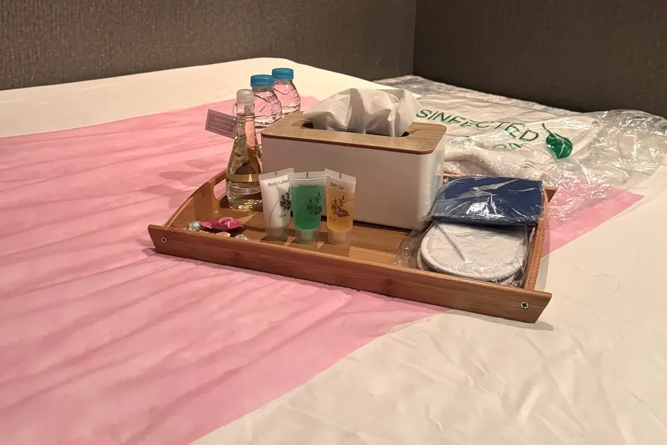 Sealed amenity pack set out for a guest